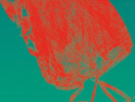 An abstract image featuring a stylized, bright red object, resembling a backpack, against a teal background. The lines and texture create a dynamic effect, emphasizing the object's shape and design.