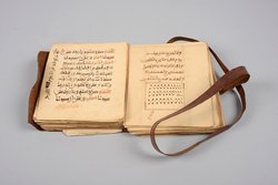 Koranauszüge in Umschlag
