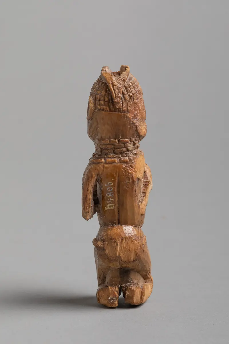 Kniende Figur
