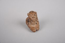 Knieende Figur
