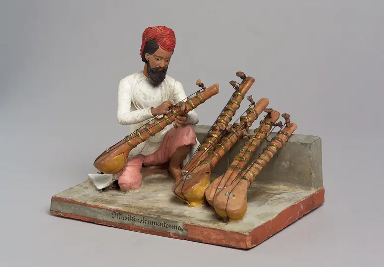 Modell: Musikinstrumentenmacher