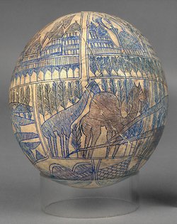 Ostrich egg decorated with animals and trees