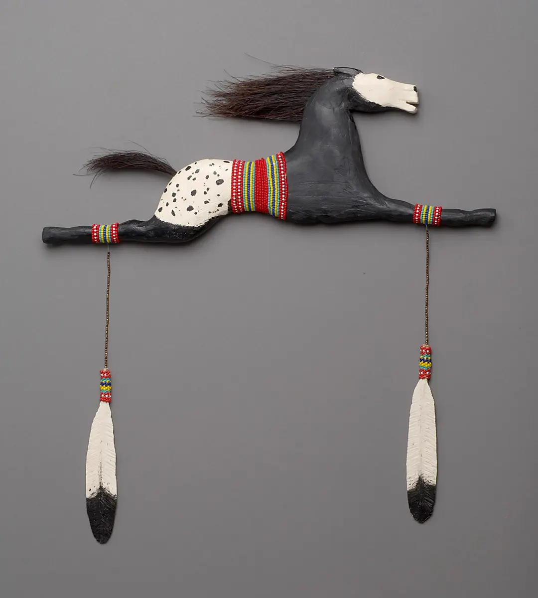 Horse-memorial wood carving 