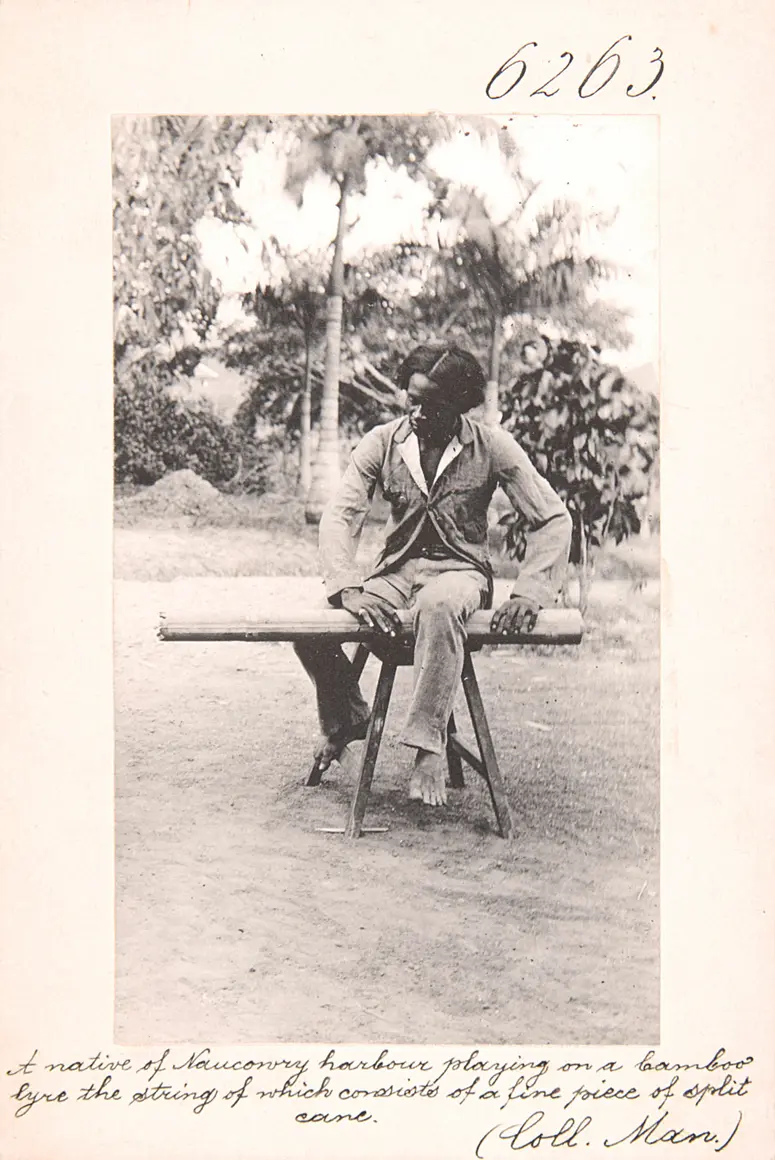 A native of Naucowry harbour playing on a bamboo lyre the string of which consists of a fine piece of split cane