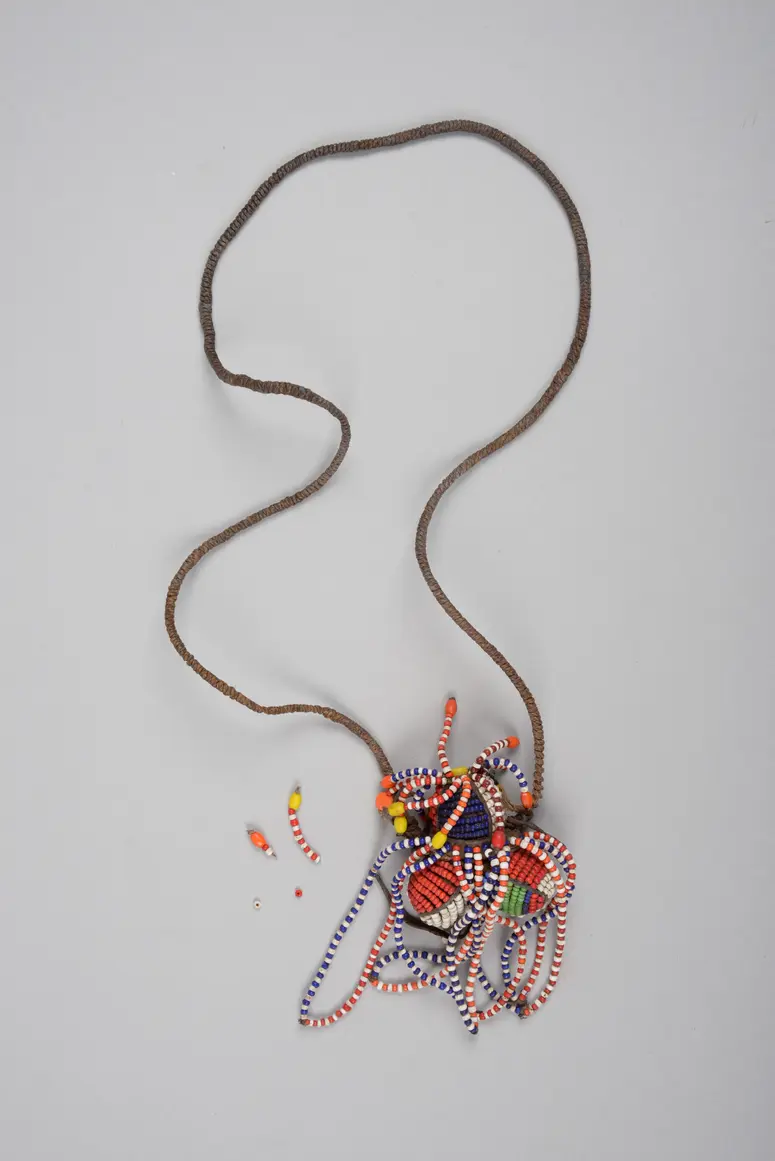 Fertility Symbol: Chain with Doll