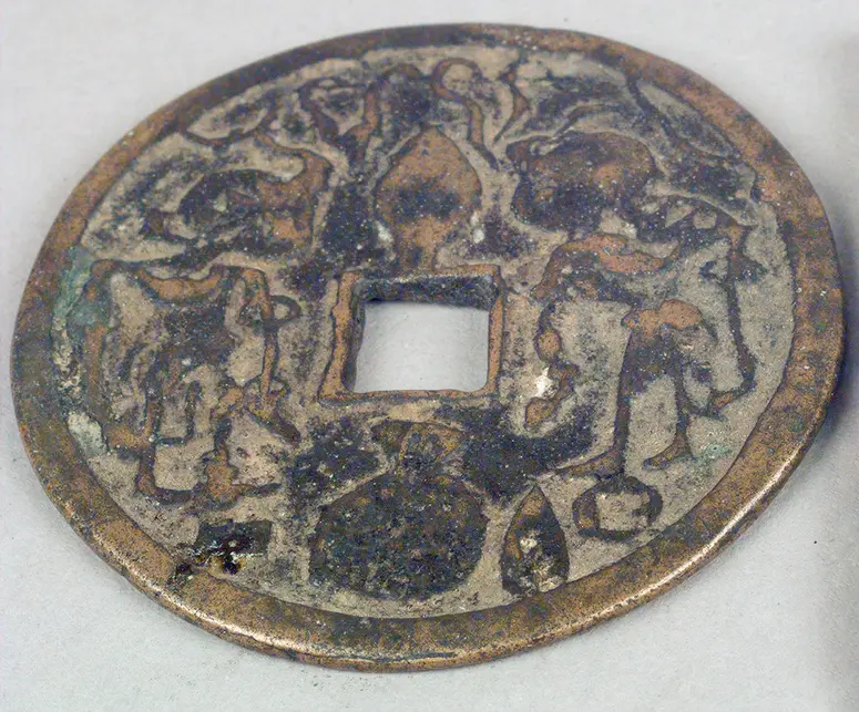 Münzen als Talisman, „Magic Coin“ Wayang-Darstellung: Prinz Panji und Prinzessin Candra Kirana