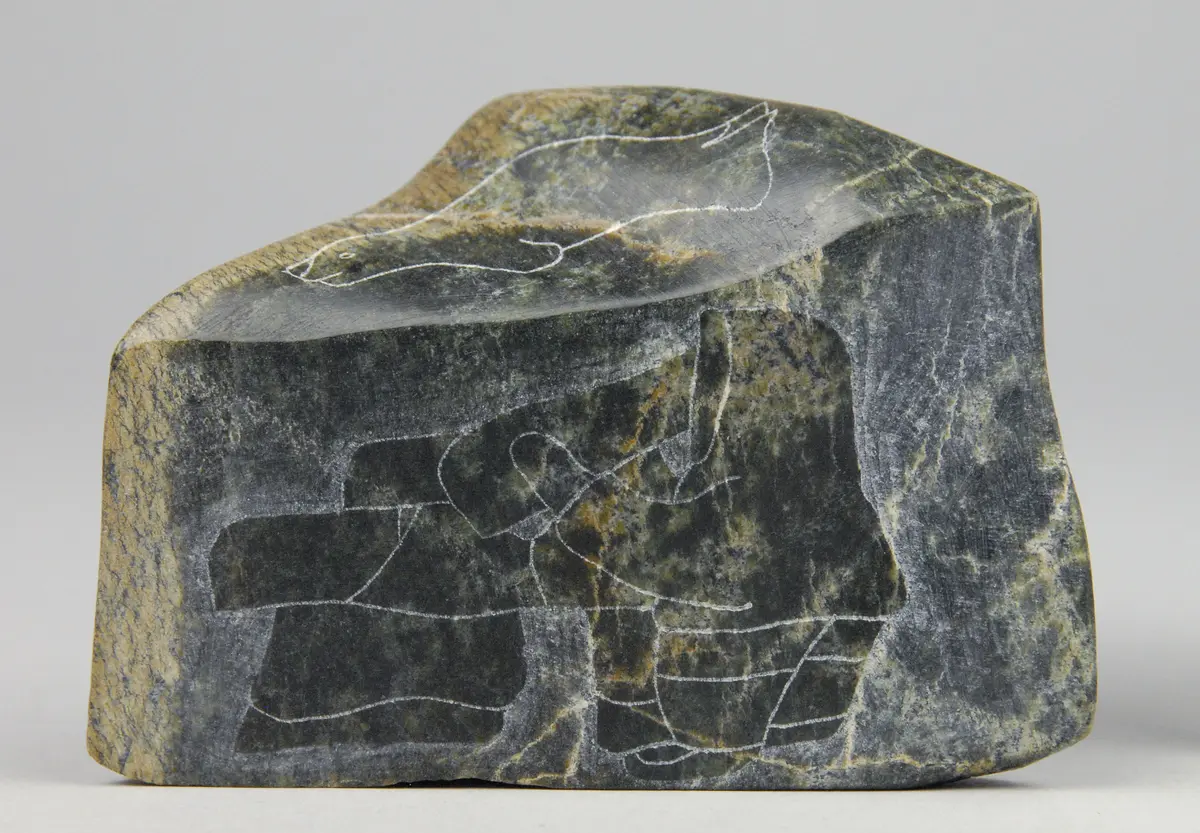 Skulptur mit eingeritzem Inuksuk