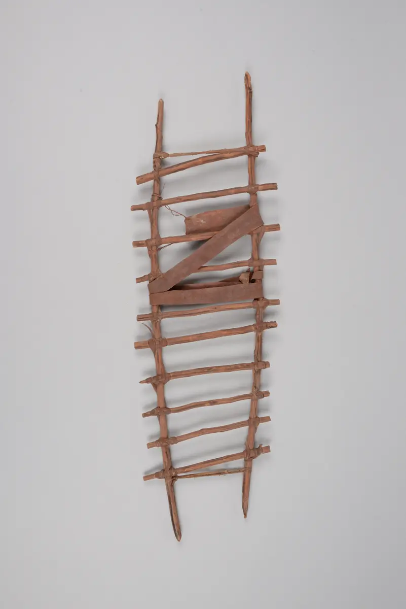 Toy in the form of a child carrier