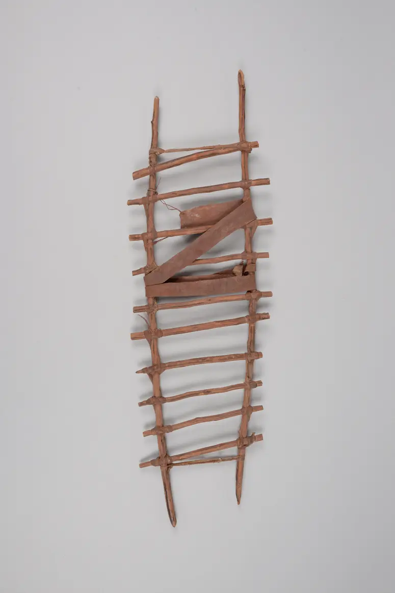 Toy in the form of a child carrier