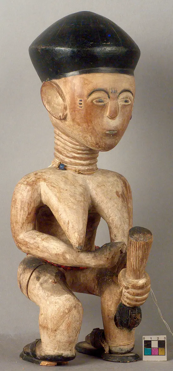 Female figure with child