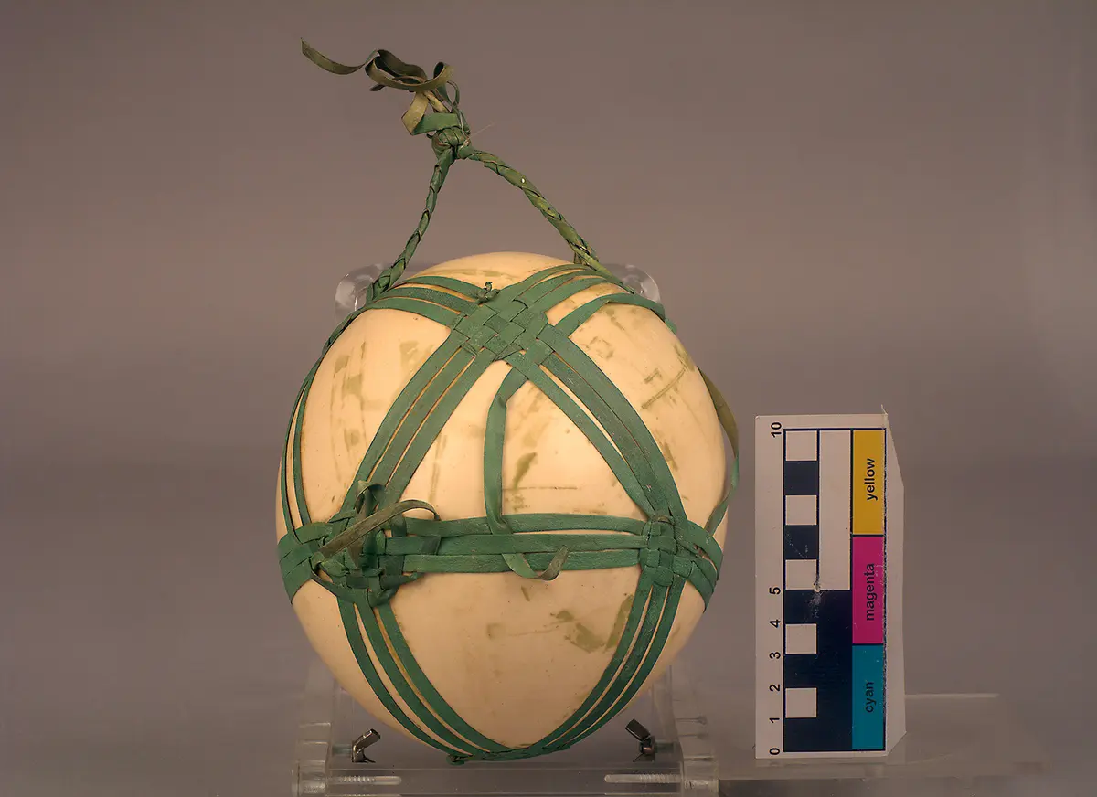 Ostrich egg with braided net (drinking vessel)