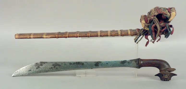 Sword, scabbard and amulet container