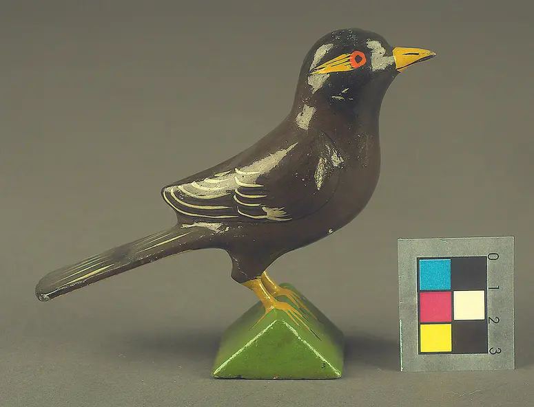 Spielzeug Vogel