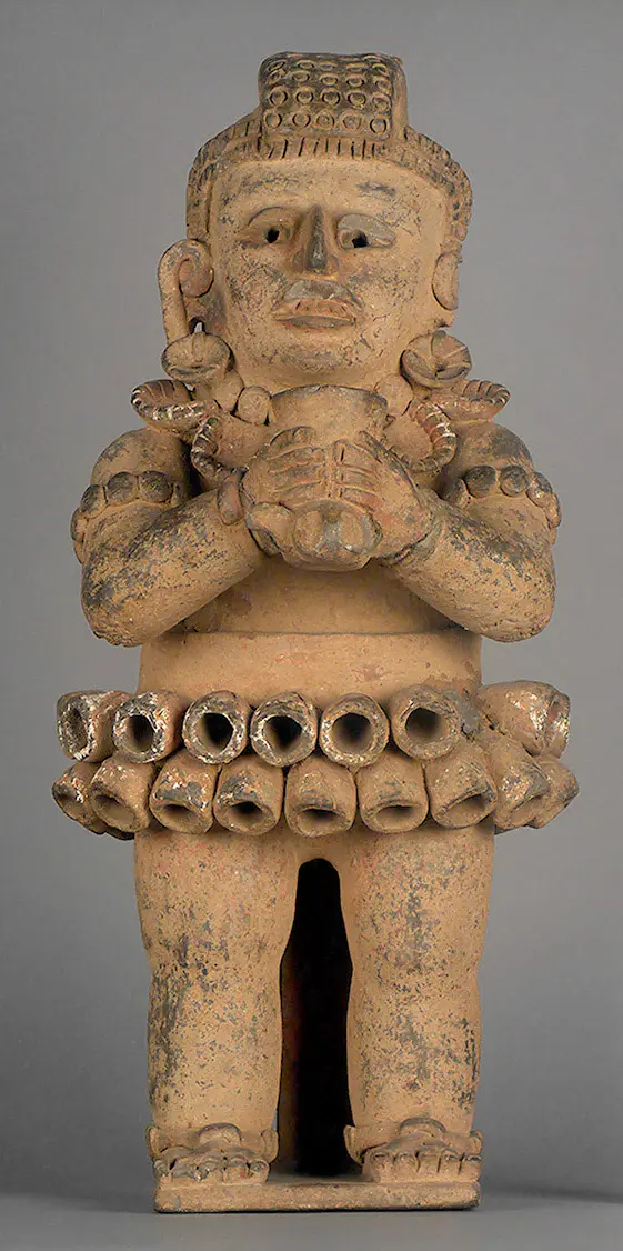 Figure with sacrificial bowl