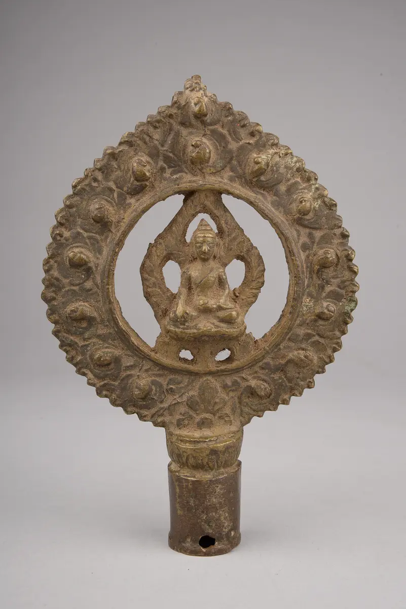 Attachment of a ritual begging staff
