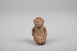 Knieende Figur