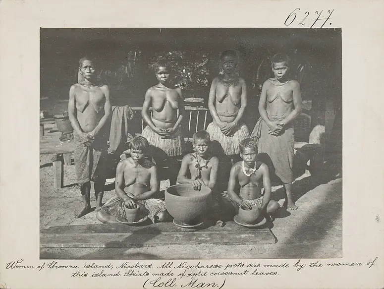 Women of Chowra island, Nicobars. All Nicobarese pots are made by the women of this island. Skirts made of split cocoosnut leaves