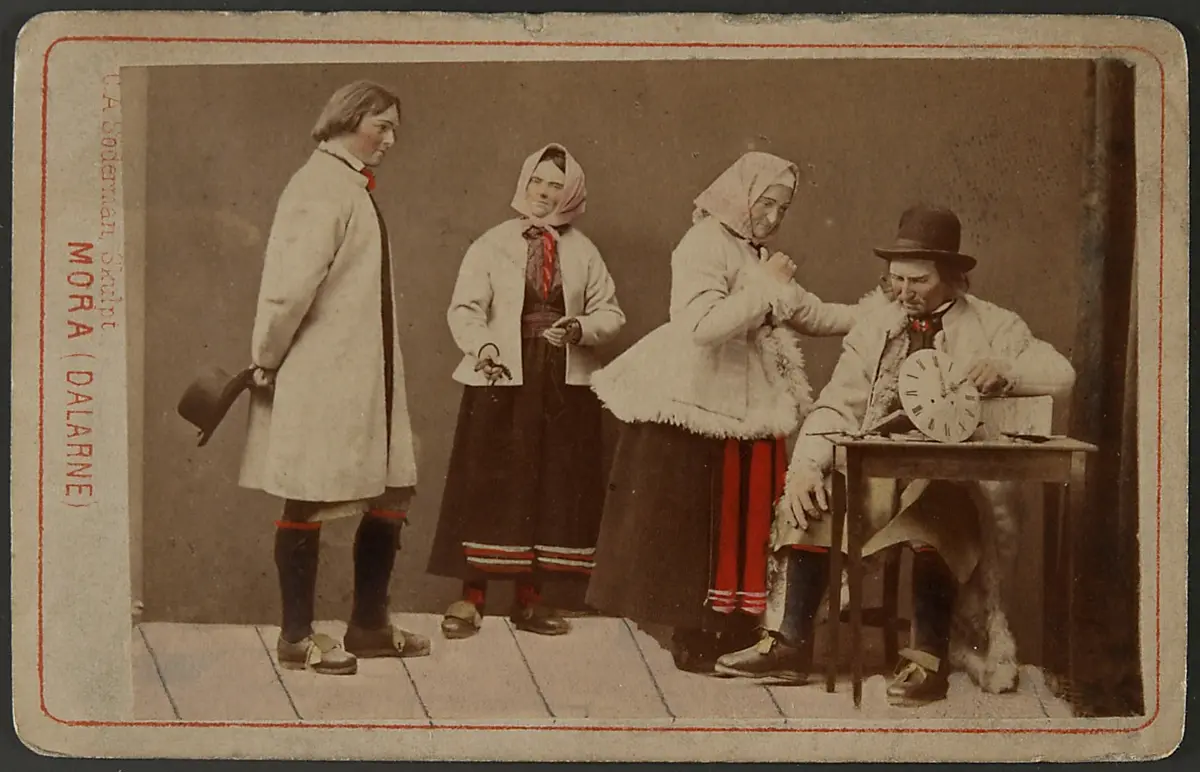 Group of wax figures in traditional costumes from Mora, Dalarna, Sweden