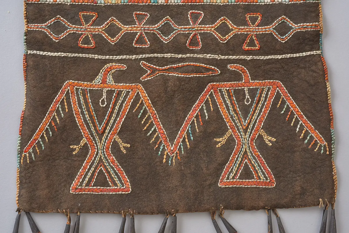 Black-dyed pouch with Thunderbird and Sturgeon