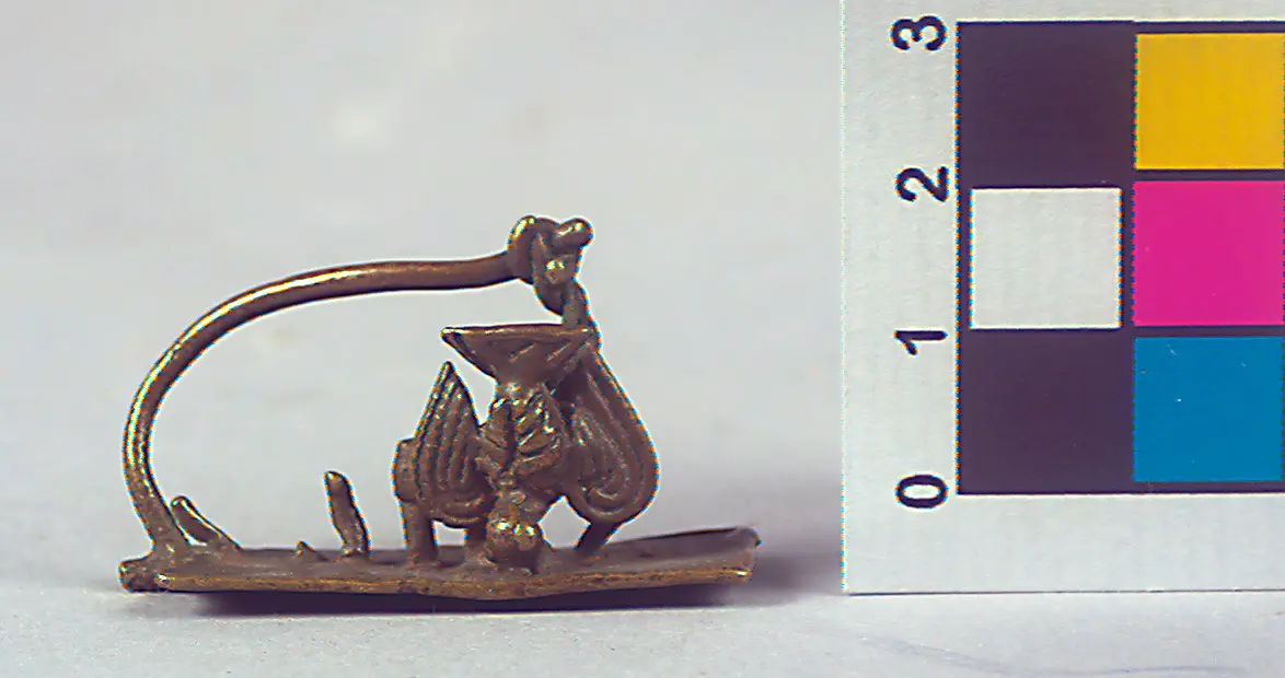Goldweight: bird in sling