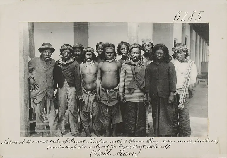 Natives of the coast tribe of Great Nicobar with 2 Shom Pen, son and father, (natives of the inland tribe of that island)