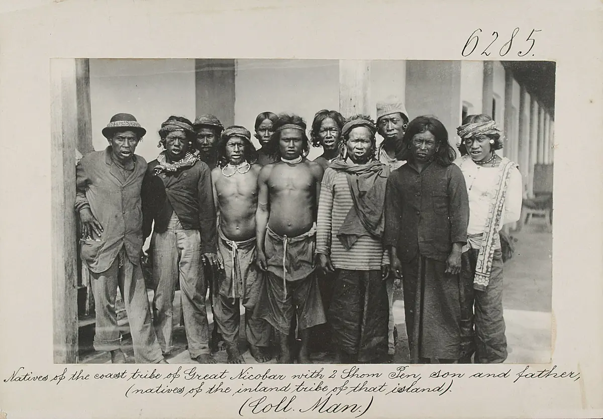 Natives of the coast tribe of Great Nicobar with 2 Shom Pen, son and father, (natives of the inland tribe of that island)