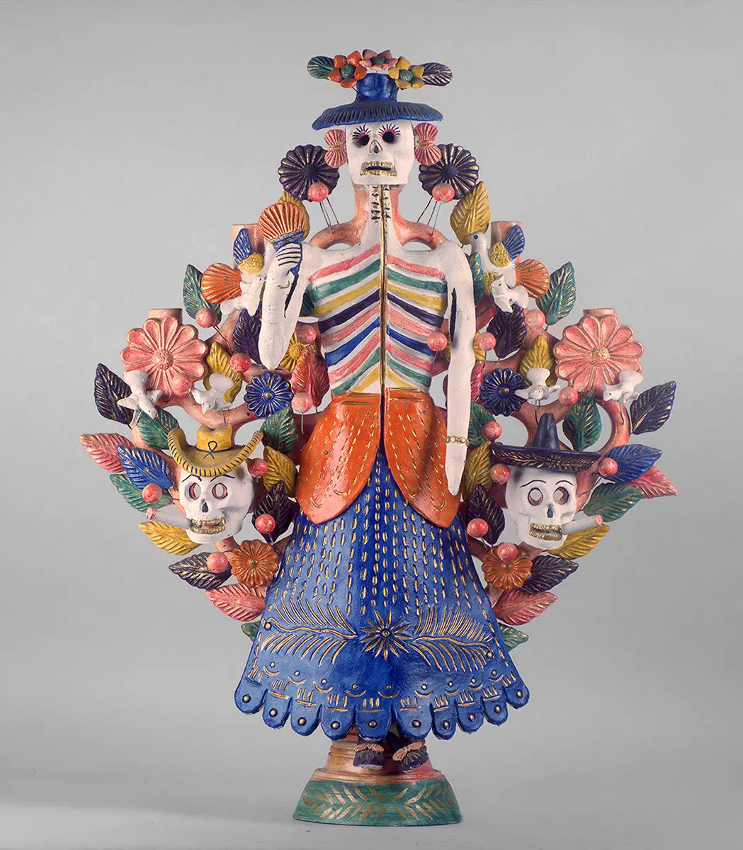Candelabrum with Catrina and skulls in branches