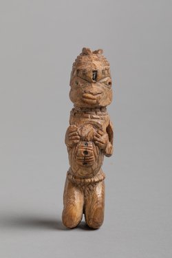 Kniende Figur