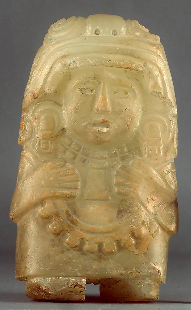 Frauenfigur mit Quechquemitl und Wickelrock