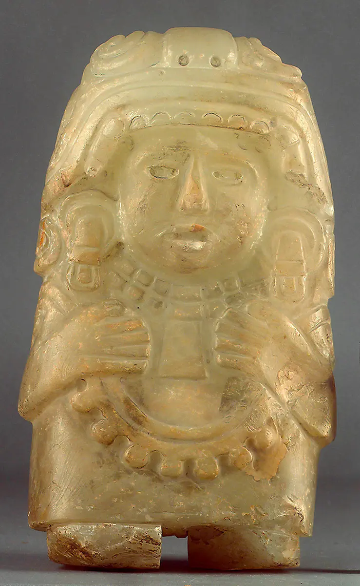Frauenfigur mit Quechquemitl und Wickelrock