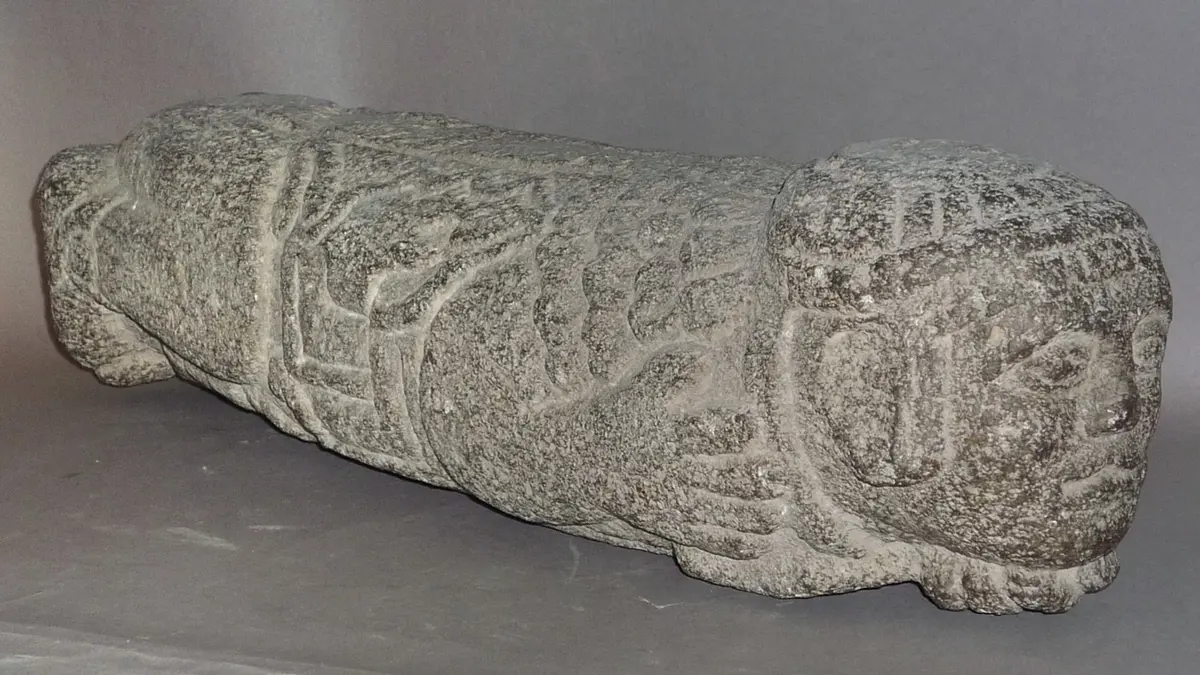 Sculpture formed as a slit drum (Teponaztli)