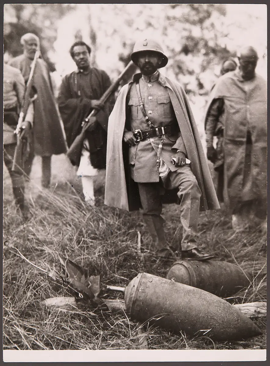 Emperor Haile Selassie with Italian unexploded aerial bombs